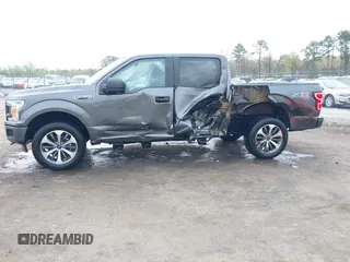 2020 Ford F-150 XL with VIN 1FTEW1EP4LFA55536, listed as a IAAI auction lot 41923442 with 99,859 mi miles and . Bid and sale history available at DreamBid. Image 14.