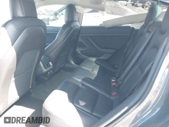 2020 Tesla Model 3 Standard Range Plus with VIN 5YJ3E1EA5LF644282, listed as a IAAI auction lot 41710124 with 69,969 mi miles and . Bid and sale history available at DreamBid. Image 8.