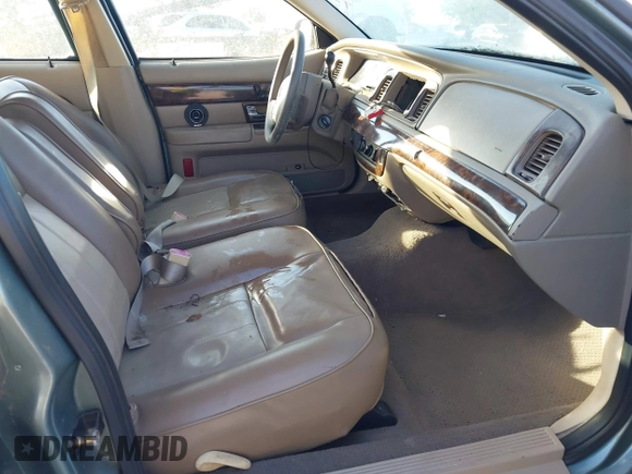 2005 Mercury Grand Marquis GS with VIN 2MEFM74WX5X627625, listed as a IAAI auction lot 41982651 with 87,044 mi miles and . Bid and sale history available at DreamBid. Image 5.