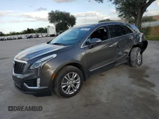 2020 Cadillac XT5 Premium Luxury FWD with VIN 1GYKNCRSXLZ126926, listed as a Copart auction lot 42656465 with 146,576 mi miles and Salvage Title. Bid and sale history available at carsss.com. Image 1.