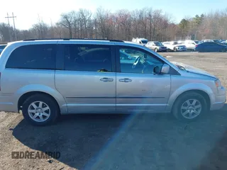 2010 Chrysler Town & Country Touring with VIN 2A4RR5D14AR359169, listed as a IAAI auction lot 41900856 with 204,595 mi miles and . Bid and sale history available at DreamBid. Image 13.