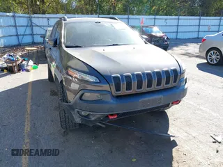 2014 Jeep Cherokee Trailhawk with VIN 1C4PJMBB0EW237741, listed as a IAAI auction lot 40505251 with 139,883 mi miles and . Bid and sale history available at DreamBid. Image 6.
