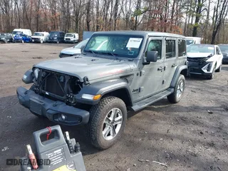 2021 Jeep Wrangler Unlimited Willys Sport with VIN 1C4HJXDGXMW767633, listed as a IAAI auction lot 41700168 with 37,994 mi miles. Bid and sale history available at carsss.com. Image 17.