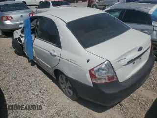 2008 Kia Spectra EX z VIN KNAFE122985582675, wystawiony jako Copart lot #52241075 z przebiegiem 194 224 mil mil oraz Szkoda całkowita • Salvage title. Historia ofert i sprzedaży dostępna na DreamBid. Obrazek 2.