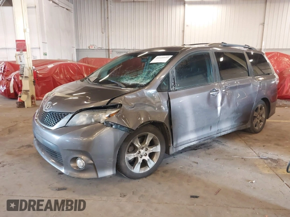 2011 Toyota Sienna SE with VIN 5TDXK3DC7BS034516, listed as a IAAI auction lot 41539955 with 209,309 mi miles. Bid and sale history available at carsss.com. Image 22.