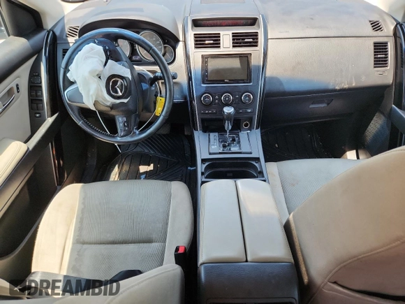 2015 Mazda CX-9 Sport с VIN JM3TB2BA5F0459548, выставлен на аукционе Copart как лот 60217845 с пробегом 152 486 миль миль и Чистый • Clean title. История ставок и продаж доступна на DreamBid. Изображение 8.
