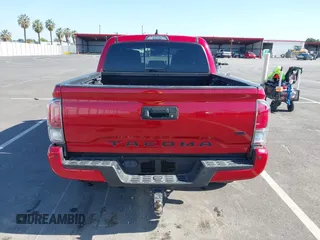 2021 Toyota Tacoma SR z VIN 5TFCZ5AN8MX247421, wystawiony jako IAAI lot #42147910 z przebiegiem 94 467 mil mil oraz . Historia ofert i sprzedaży dostępna na DreamBid. Obrazek 17.