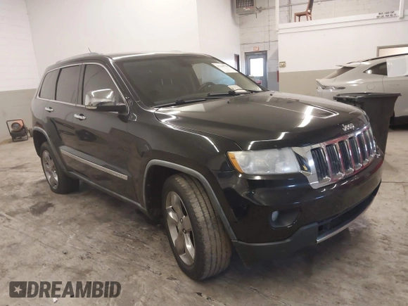 2012 Jeep Grand Cherokee Limited with VIN 1C4RJEBG4CC129194, listed as a IAAI auction lot 41168750 with 184,077 mi miles. Bid and sale history available at carsss.com. Image 1.