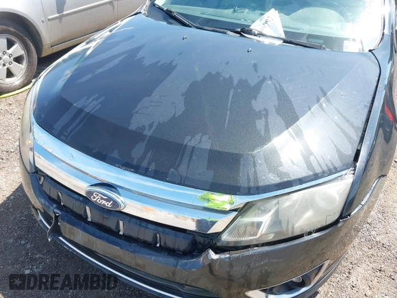 2011 Ford Fusion SE with VIN 3FAHP0HA6BR153888, listed as a IAAI auction lot 42009992 with 213,676 mi miles. Bid and sale history available at carsss.com. Image 10.