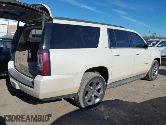 2015 GMC Yukon XL SLT with VIN 1GKS2HKC0FR179223, listed as a IAAI auction lot 40964120 with 184,592 mi miles. Bid and sale history available at carsss.com. Image 4.