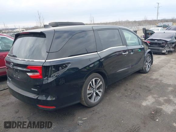 2023 Honda Odyssey Touring with VIN 5FNRL6H81PB068721, listed as a IAAI auction lot 41489618 with 20,202 mi miles and . Bid and sale history available at DreamBid. Image 4.