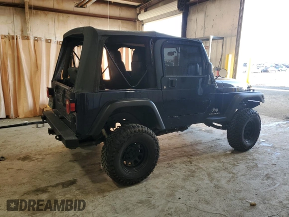 2006 Jeep Wrangler SE with VIN 1J4FA29126P705827, listed as a Copart auction lot 82226674 with 165,632 mi miles and Salvage Title. Bid and sale history available at carsss.com. Image 3.
