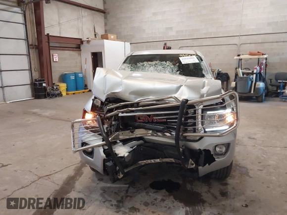 2015 GMC Canyon 4WD SLE with VIN 1GTG6BE36F1124627, listed as a IAAI auction lot 41623806 with 104,182 mi miles and . Bid and sale history available at carsss.com. Image 12.