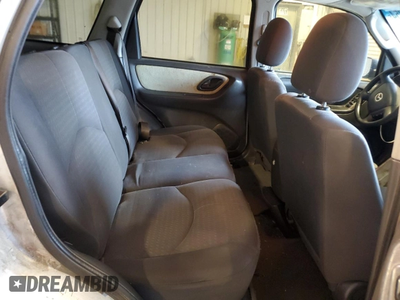 2006 Mazda Tribute i with VIN 4F2YZ02Z86KM02172, listed as a Copart auction lot 73214254 with 317,446 mi miles and Salvage Title. Bid and sale history available at DreamBid. Image 10.
