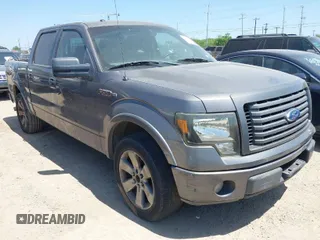 2011 Ford F-150 XL with VIN 1FTFW1CF6BKD65045, listed as a IAAI auction lot 42016709 with 167,063 mi miles. Bid and sale history available at carsss.com. Image 1.