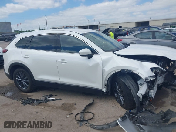 2022 Mazda CX-9 Touring with VIN JM3TCBCY0N0608052, listed as a IAAI auction lot 42027465 with 65,313 mi miles and . Bid and sale history available at DreamBid. Image 13.