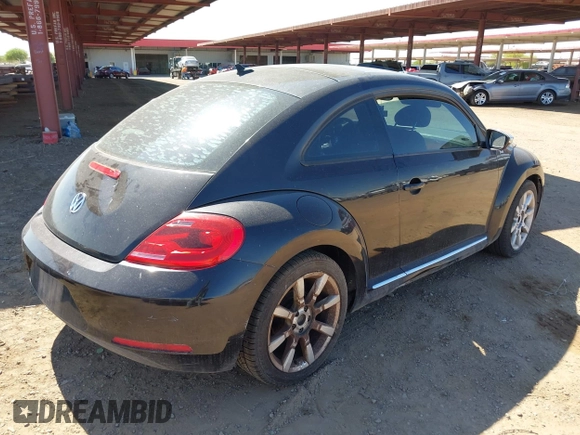 2013 Volkswagen Beetle 2.5L with VIN 3VWJP7ATXDM679115, listed as a IAAI auction lot 42212965 with Not Provided miles and . Bid and sale history available at DreamBid. Image 4.