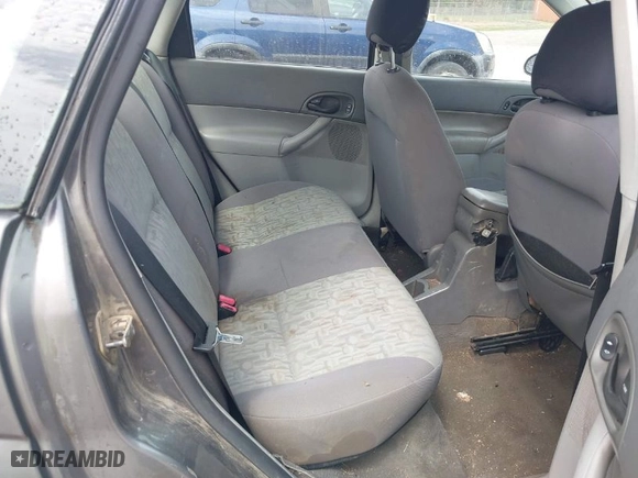2005 Ford Focus S with VIN 1FAFP34NX5W174164, listed as a IAAI auction lot 41930295 with 295,848 mi miles. Bid and sale history available at carsss.com. Image 8.