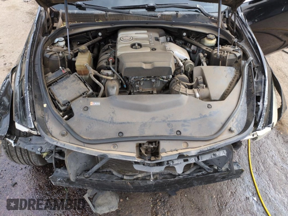 2014 Cadillac CTS RWD z VIN 1G6AP5SX6E0193868, wystawiony jako Copart lot #51795485 z przebiegiem 100 039 mil mil oraz Szkoda całkowita • Salvage title. Historia ofert i sprzedaży dostępna na DreamBid. Obrazek 11.