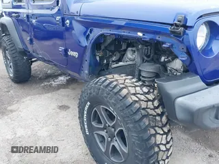 2019 Jeep Wrangler Unlimited Sport Altitude with VIN 1C4HJXDG6KW578572, listed as a IAAI auction lot 41921919 with 30,247 mi miles and . Bid and sale history available at DreamBid. Image 6.