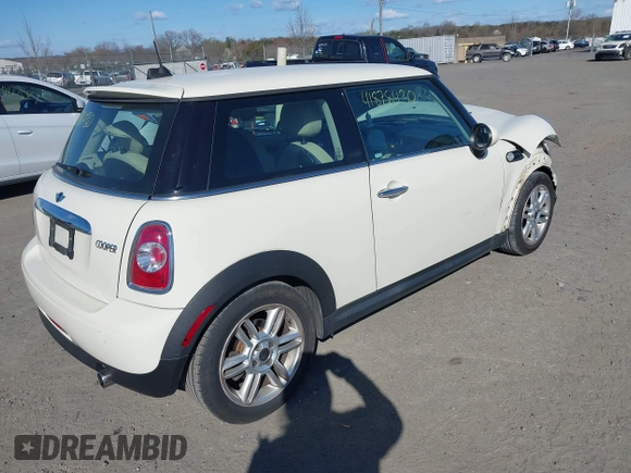 2012 MINI Hardtop with VIN WMWSU3C59CT255588, listed as a IAAI auction lot 41878430 with 103,033 mi miles and . Bid and sale history available at DreamBid. Image 4.