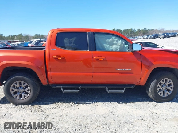 2018 Toyota Tacoma SR5 with VIN 5TFAZ5CN5JX066115, listed as a IAAI auction lot 41816133 with 70,283 mi miles and . Bid and sale history available at DreamBid. Image 13.