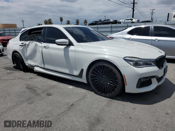 2016 BMW 7 Series 750i z VIN WBA7F0C56GGL99130, wystawiony jako Copart lot #56972905 z przebiegiem 100 556 mil mil oraz Czysty tytuł • Clean title. Historia ofert i sprzedaży dostępna na DreamBid. Obrazek 4.