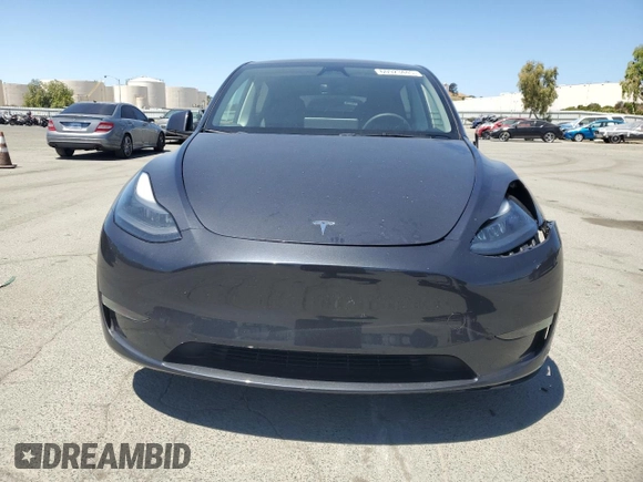 2024 Tesla Model Y Long Range с VIN 7SAYGDEE1RF060140, выставлен на аукционе Copart как лот 60923445 с пробегом 12 765 миль миль и Списание • Salvage title. История ставок и продаж доступна на DreamBid. Изображение 5.
