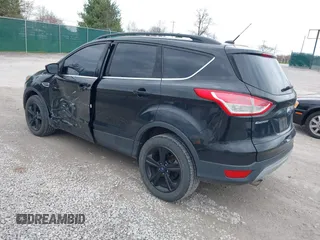 2015 Ford Escape SE with VIN 1FMCU9GX8FUC41438, listed as a IAAI auction lot 41869587 with 109,728 mi miles. Bid and sale history available at carsss.com. Image 3.