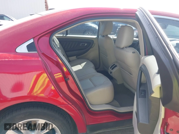 2011 Ford Taurus SEL z VIN 1FAHP2EW7BG123740, wystawiony jako IAAI lot #41890761 z przebiegiem 132 310 mil mil oraz . Historia ofert i sprzedaży dostępna na DreamBid. Obrazek 8.