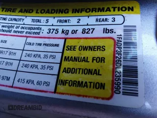 2013 Ford Focus SE with VIN 1FADP3F26DL235990, listed as a IAAI auction lot 41759160 with 120,715 mi miles. Bid and sale history available at carsss.com. Image 9.