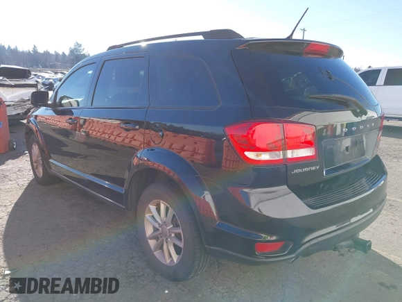 2013 Dodge Journey SXT with VIN 3C4PDCBGXDT589405, listed as a IAAI auction lot 41421902 with 152,964 mi miles and . Bid and sale history available at DreamBid. Image 3.