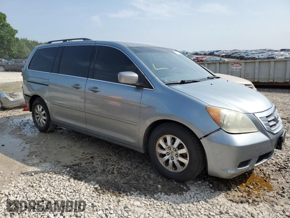 2010 Honda Odyssey EX with VIN 5FNRL3H48AB086975, listed as a Copart auction lot 60258265 with 184,344 mi miles and Salvage title. Bid and sale history available at DreamBid. Image 4.