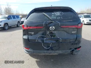 2025 Mazda CX-90 Premium Sport z VIN JM3KKCHD1S1221462, wystawiony jako IAAI lot #41765034 z przebiegiem Nie podano mil oraz . Historia ofert i sprzedaży dostępna na DreamBid. Obrazek 16.