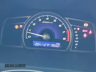 2007 Honda Civic EX with VIN JHMFA16817S003920, listed as a IAAI auction lot 42148836 with 204,112 mi miles and . Bid and sale history available at DreamBid. Image 7.