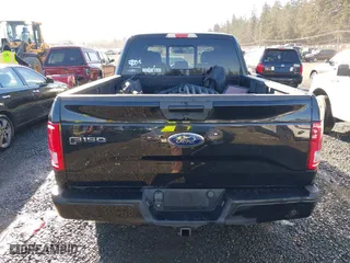 2015 Ford F-150 XLT w/HD Payload Pkg with VIN 1FTFW1EG5FFC13942, listed as a IAAI auction lot 41392709 with 196,416 mi miles. Bid and sale history available at carsss.com. Image 17.