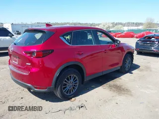 2019 Mazda CX-5 Sport with VIN JM3KFBBM6K1596402, listed as a IAAI auction lot 41971766 with 60,396 mi miles and . Bid and sale history available at DreamBid. Image 4.