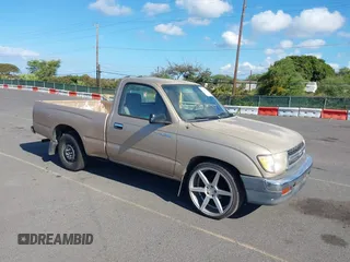 1998 Toyota Tacoma with VIN 4TANL42N7WZ006553, listed as a IAAI auction lot 41892709 with 130,140 mi miles. Bid and sale history available at carsss.com. Image 1.