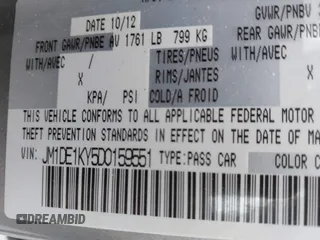 2013 Mazda Mazda2 Sport with VIN JM1DE1KY5D0159551, listed as a IAAI auction lot 41903043 with 107,858 mi miles. Bid and sale history available at carsss.com. Image 9.