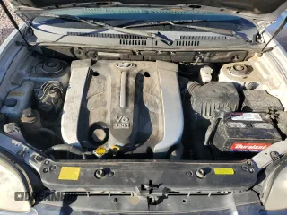 2005 Hyundai Santa Fe GLS with VIN KM8SC13E35U874870, listed as a Copart auction lot 75692594 with 103,884 mi miles and Clean Title. Bid and sale history available at carsss.com. Image 12.