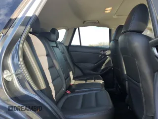 2014 Mazda CX-5 Grand Touring with VIN JM3KE2DY4E0323603, listed as a Copart auction lot 49884835 with 0 mi miles and Salvage Title. Bid and sale history available at carsss.com. Image 11.
