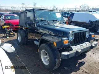2002 Jeep Wrangler X with VIN 1J4FA39S52P770664, listed as a IAAI auction lot 41661580 with 122,445 mi miles. Bid and sale history available at carsss.com. Image 1.