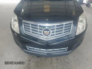 2014 Cadillac SRX z VIN 3GYFNAE39ES558430, wystawiony jako Copart lot #54555645 z przebiegiem 119 524 mil mil oraz Szkoda całkowita • Salvage title. Historia ofert i sprzedaży dostępna na DreamBid. Obrazek 12.