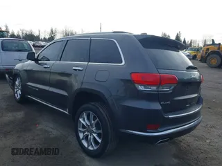 2015 Jeep Grand Cherokee Summit with VIN 1C4RJFJTXFC911170, listed as a IAAI auction lot 41523164 with 74,133 mi miles. Bid and sale history available at carsss.com. Image 3.