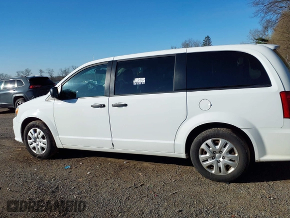 2019 Dodge Grand Caravan SE with VIN 2C4RDGBG2KR799660, listed as a IAAI auction lot 41898556 with 104,642 mi miles and . Bid and sale history available at DreamBid. Image 15.