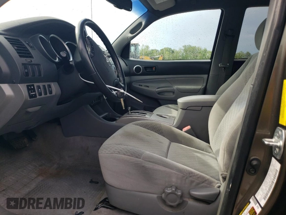 2009 Toyota Tacoma PreRunner with VIN 3TMJU62N19M072162, listed as a Copart auction lot 54449375 with 280,528 mi miles and Salvage title. Bid and sale history available at DreamBid. Image 7.