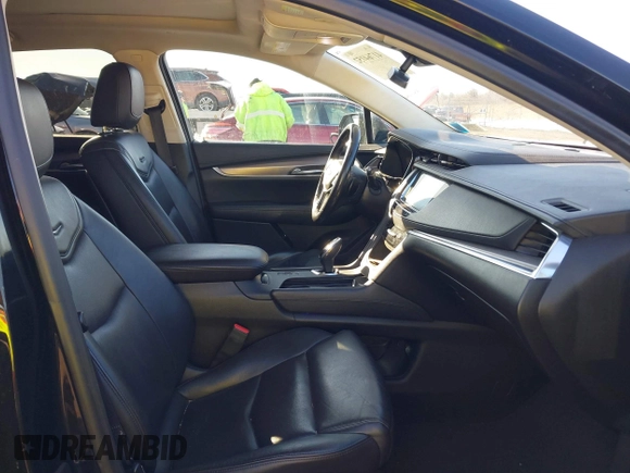 2019 Cadillac XT5 Premium Luxury AWD z VIN 1GYKNFRS1KZ250468, wystawiony jako IAAI lot #41764152 z przebiegiem 107 918 mil mil oraz . Historia ofert i sprzedaży dostępna na DreamBid. Obrazek 5.