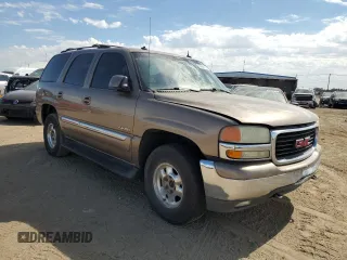 2003 GMC Yukon SLT with VIN 1GKEK13Z43R219290, listed as a Copart auction lot 69303144 with 299,023 mi miles and Salvage Title. Bid and sale history available at carsss.com. Image 4.