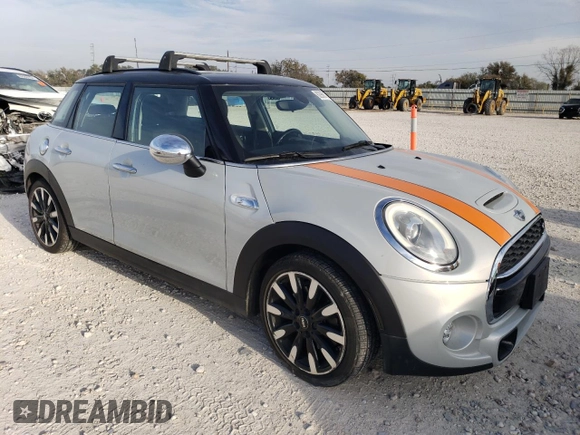 2015 MINI Cooper Hardtop 4 Door S with VIN WMWXU3C50F2B65944, listed as a Copart auction lot 82986174 with 121,207 mi miles and Clean Title. Bid and sale history available at carsss.com. Image 4.