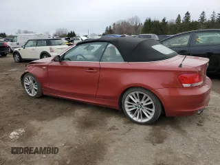 2009 BMW 1 Series 128i with VIN WBAUL73569VJ76363, listed as a Copart auction lot 52380635 with 210,519 mi miles and Salvage Title. Bid and sale history available at DreamBid. Image 2.